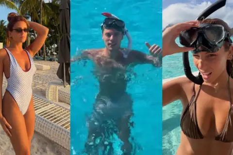 Nicola Zalewski z żoną na wakacjach. Ona w bikini na plaży i w wodzie, on pływa w morzu.