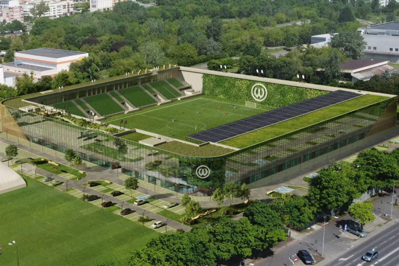 Nowoczesny stadion Warty Poznań z zielonymi dachami, panele słoneczne i pionowy ogród na ścianie.